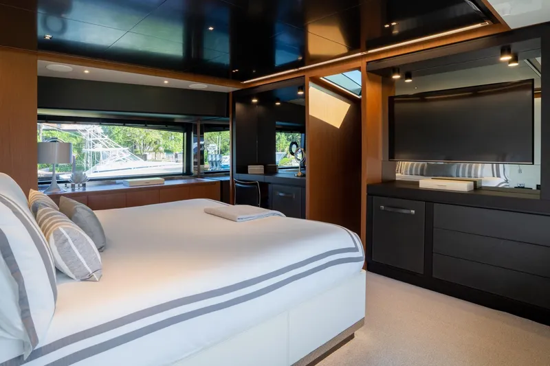 Slide: The Image of Luxurious bedroom interior on 2019 Riva ARGO yacht with modern design and large windows. - 7