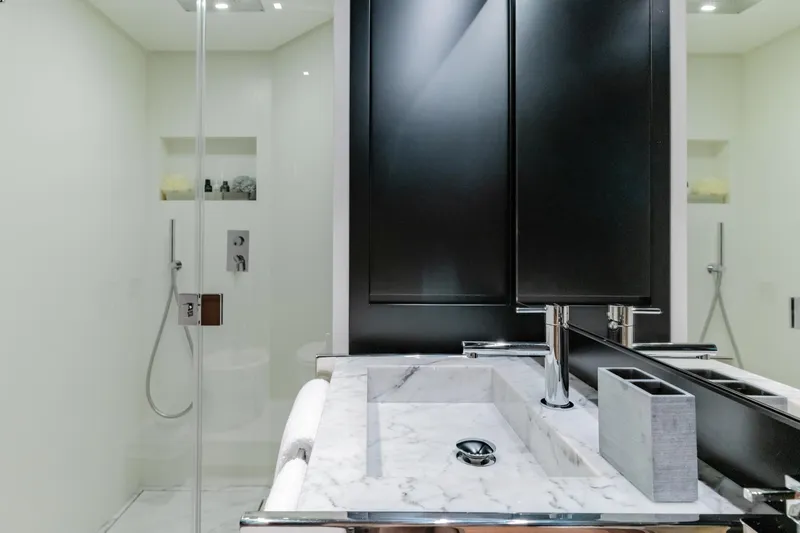 Slide: The Image of Luxurious bathroom on 2019 Riva ARGO yacht with marble sink and modern shower. - 15