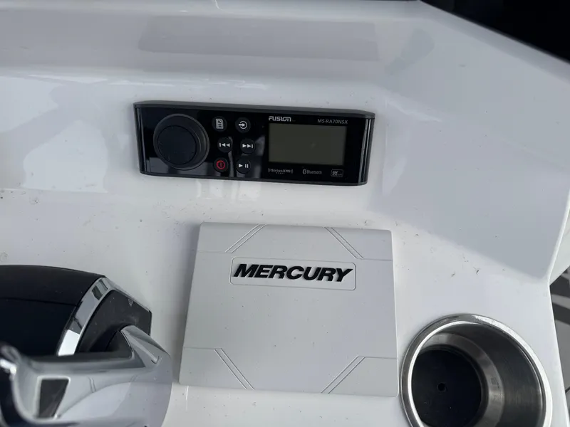 Slide: The Image of Control panel of 2025 Twin Vee 280 GFX2 CC boat with Mercury branding. - 5