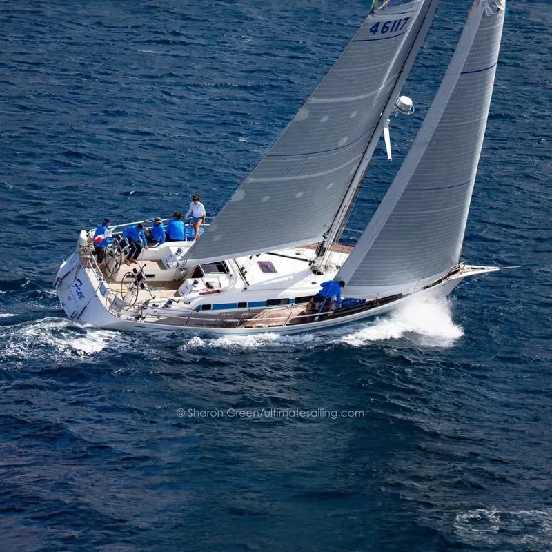 The Image of Sailing yacht Nautor Swan 46mkIII, 2006 model, navigating ocean waters with crew on deck. - 0