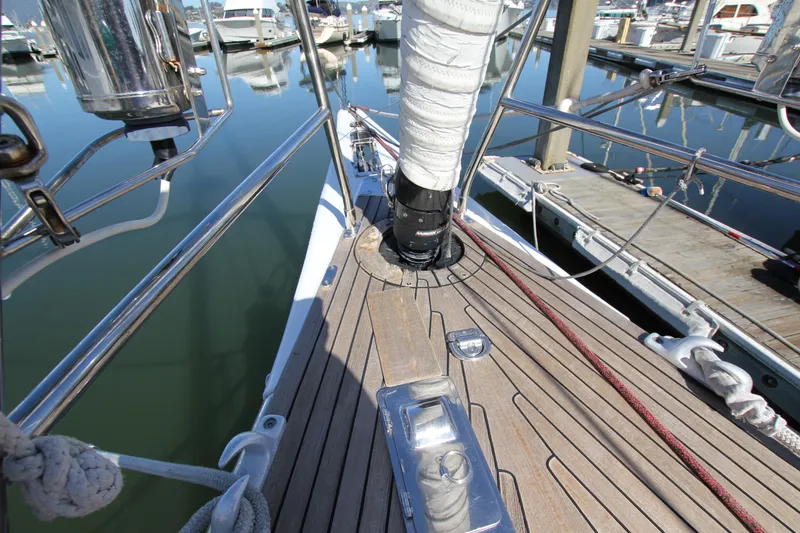 Slide: The Image of Deck of 2006 Nautor Swan 46mkIII yacht, docked at marina with polished fittings. - 10