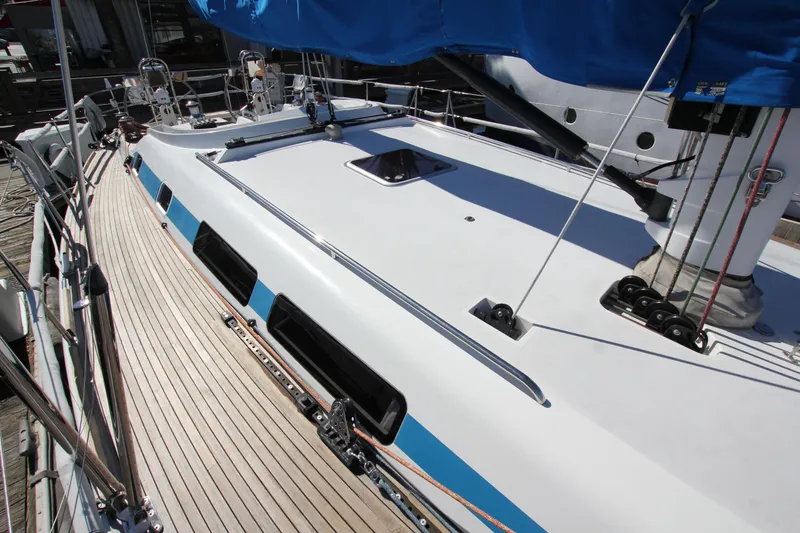 Slide: The Image of Nautor Swan 46mkIII yacht deck, 2006 model, featuring sleek design and blue accents. - 14