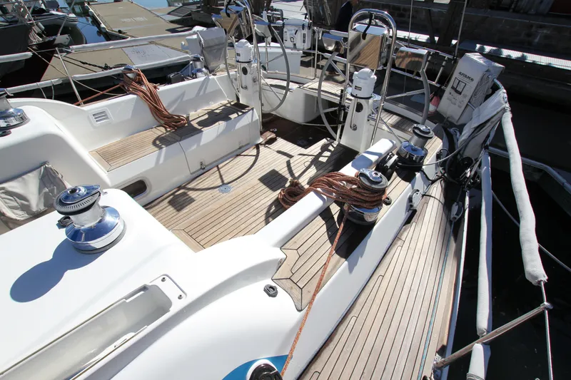 Slide: The Image of Nautor Swan 46mkIII yacht deck, 2006 model, featuring winches and teak flooring. - 18