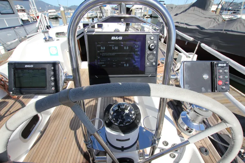 Slide: The Image of Steering wheel and navigation instruments on a 2006 Nautor Swan 46mkIII yacht. - 19