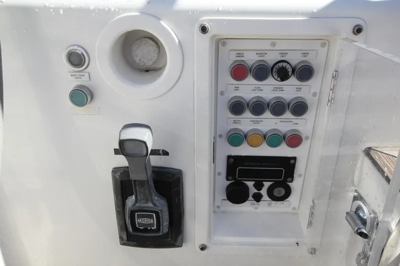 Slide: The Image of Control panel of a 2006 Nautor Swan 46mkIII yacht with various buttons and levers. - 22