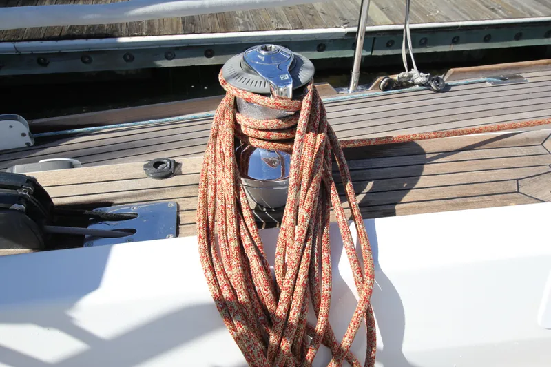Slide: The Image of Winch with rope on Nautor Swan 46mkIII yacht, 2006 model, docked at marina. - 28