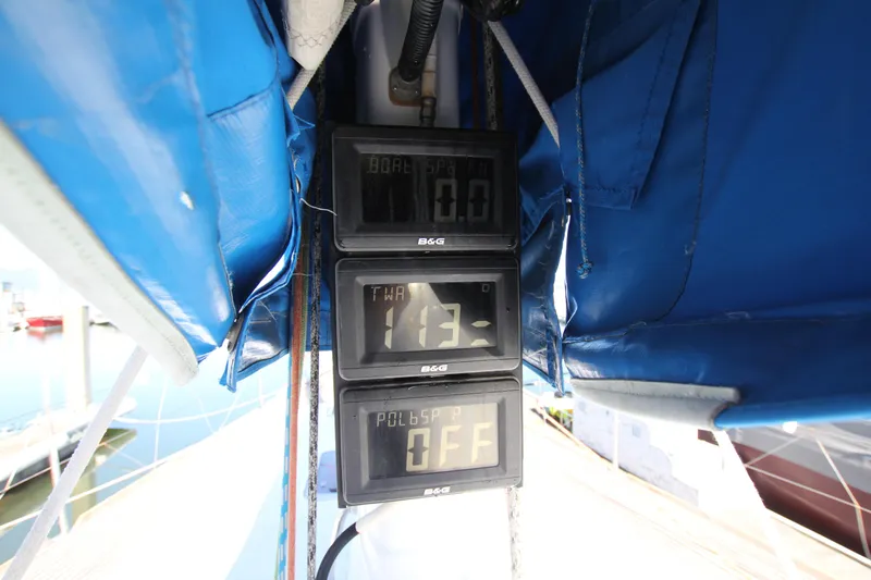 Slide: The Image of Digital displays on a 2006 Nautor Swan 46mkIII sailboat, showing navigation data. - 32