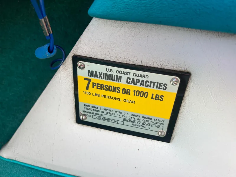 Slide: The Image of Plaque on 1992 Celebrity 180 Bowrider showing maximum capacity of 7 persons or 1000 lbs. - 17