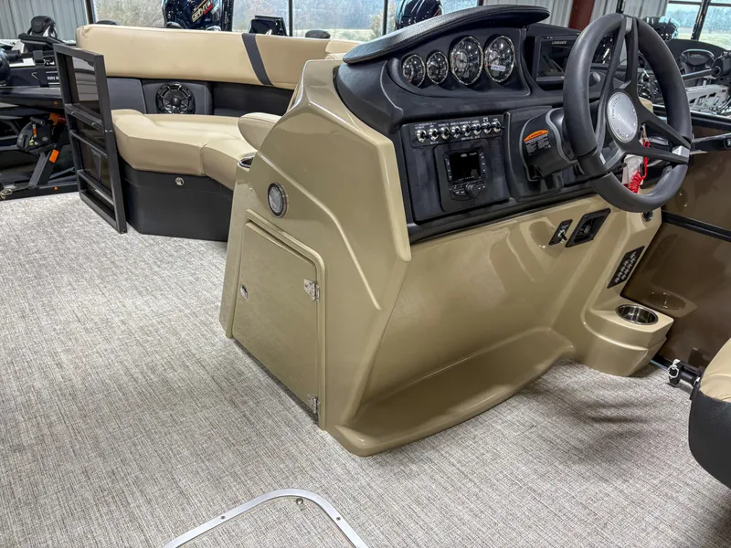 Slide: The Image of 2025 Trifecta 22 RF CS Arch boat interior with steering console and seating. - 12