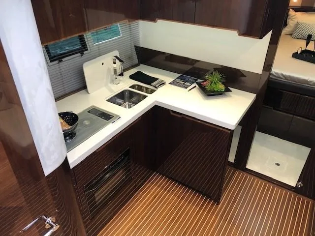 Slide: The Image of Luxurious kitchen interior of 2018 Galeon 485 yacht with modern amenities. - 21