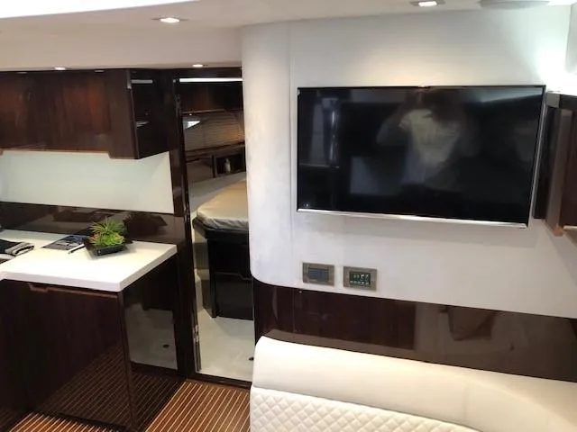 Slide: The Image of Luxurious interior of 2018 Galeon 485 yacht with modern decor and flat-screen TV. - 24
