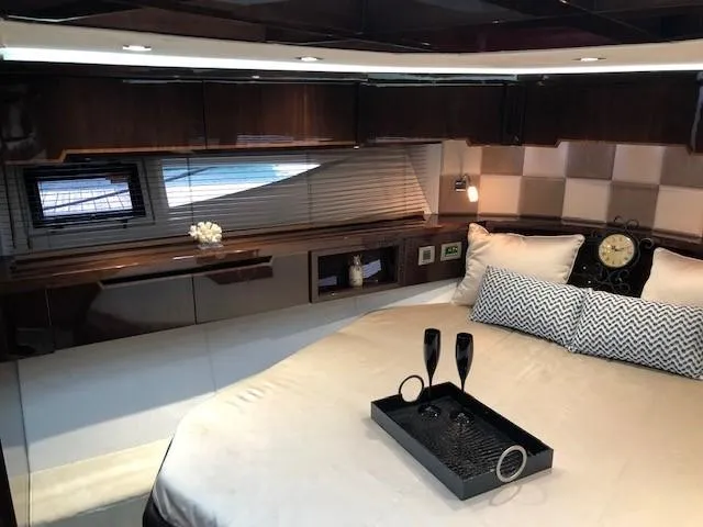 Slide: The Image of Luxurious interior of 2018 Galeon 485 yacht with elegant bedding and decor. - 31