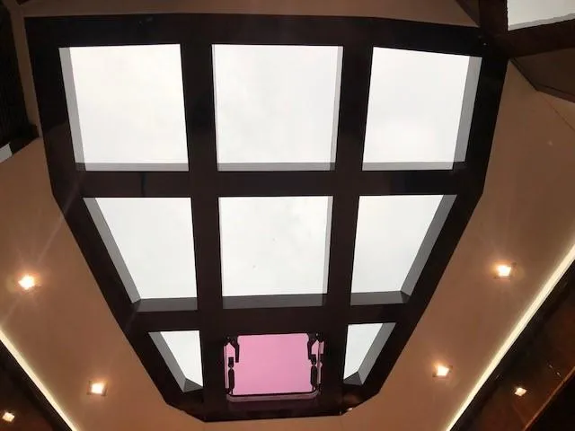 Slide: The Image of Ceiling view of 2018 Galeon 485 yacht with modern lighting and skylight. - 32