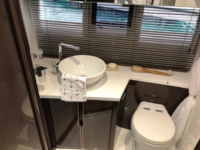 Slide: The Image of Luxurious bathroom in 2018 Galeon 485 yacht with modern fixtures and elegant design. - 35