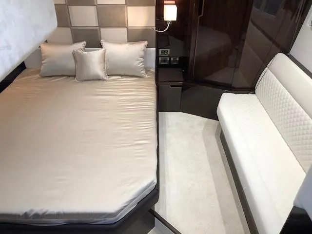 Slide: The Image of Luxurious bedroom interior of 2018 Galeon 485 yacht with elegant bedding and seating. - 37