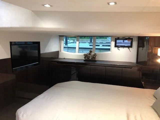 Slide: The Image of Luxurious interior of 2018 Galeon 485 yacht with modern furnishings and large windows. - 38