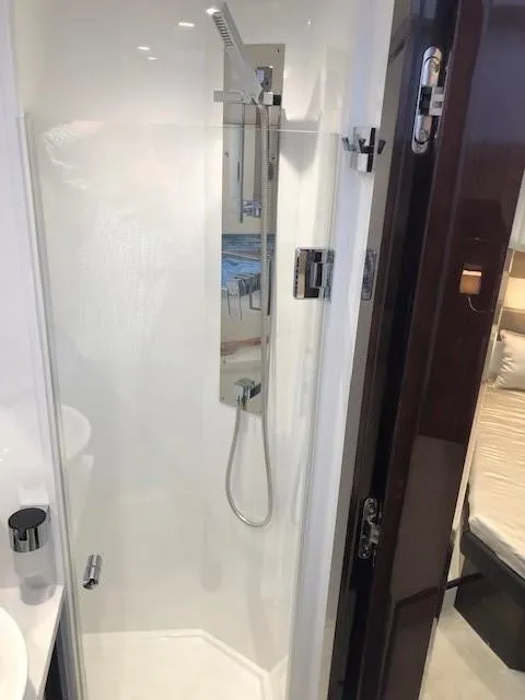 Slide: The Image of Modern shower in 2018 Galeon 485 yacht bathroom, featuring sleek design and chrome fixtures. - 44