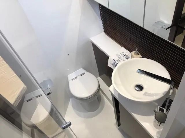 Slide: The Image of Modern bathroom in 2018 Galeon 485 yacht with sleek fixtures and compact design. - 46