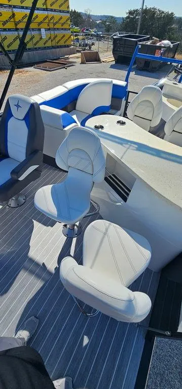 Slide: The Image of 2022 Berkshire 25E STS boat interior with modern seating and sleek design. - 20