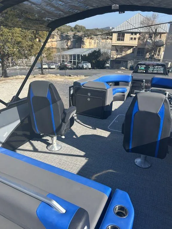Slide: The Image of 2023 Berkshire 25UL STS 3.0 pontoon boat interior with modern seating and sleek design. - 12