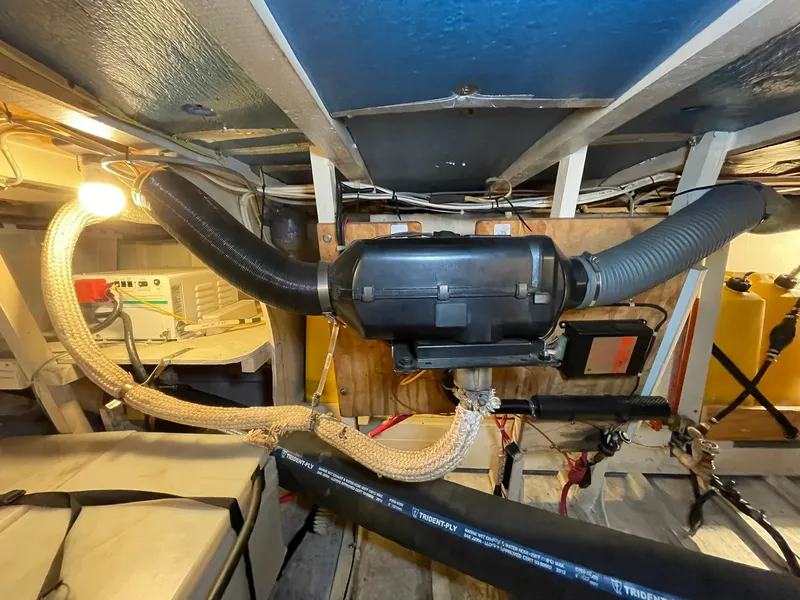 Slide: The Image of 1959 Monk Express Cruiser engine room with ventilation system and wiring. - 34