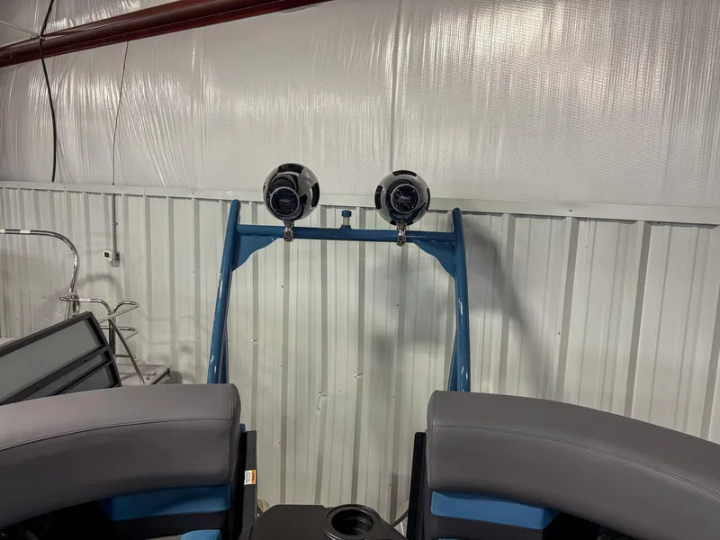 Slide: The Image of 2025 Trifecta 23RF SS 3.0 boat interior with speakers and seating. - 14