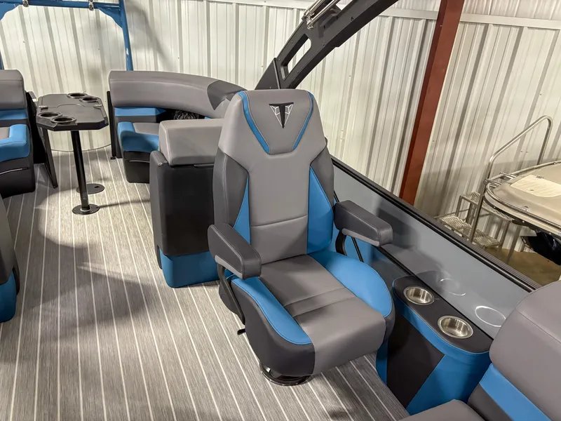 Slide: The Image of 2025 Trifecta 23RF SS 3.0 boat interior with modern seating and cup holders. - 6