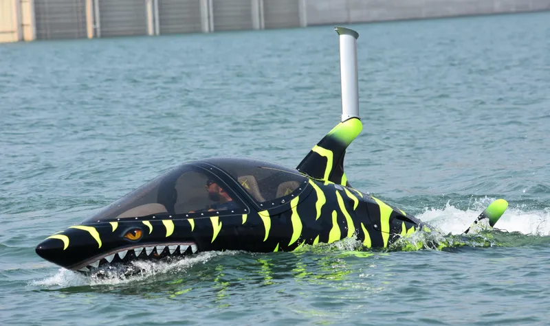 Slide: The Image of Futuristic 2025 Seabreacher X, Y, Z submarine with shark design on water surface. - 35