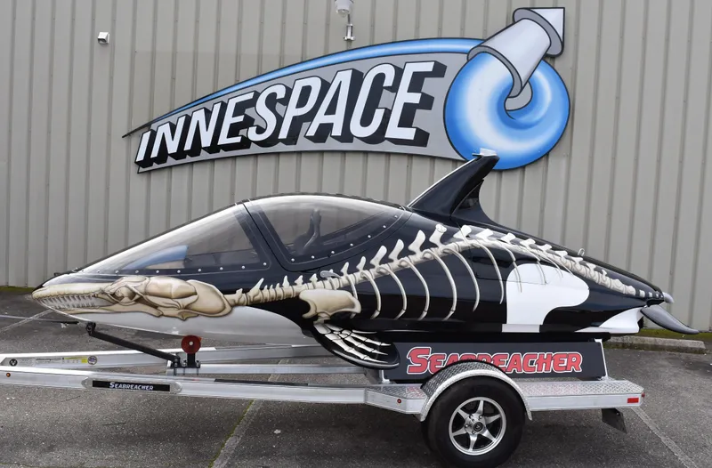 Slide: The Image of Seabreacher X, Y, Z 2025 model with shark design on trailer, Innespace logo in background. - 40