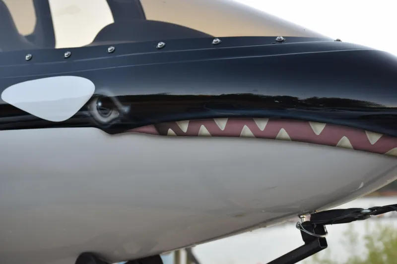 Slide: The Image of 2025 Seabreacher X, Y, Z submarine with shark-like design and sleek black and white exterior. - 8