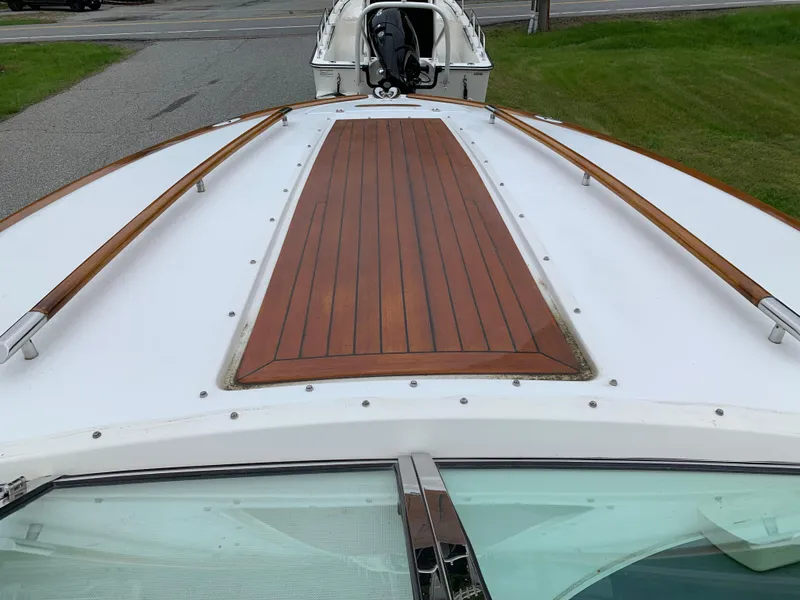 Slide: The Image of 2005 Chris-Craft Corsair 28 boat with wooden deck detail. - 29