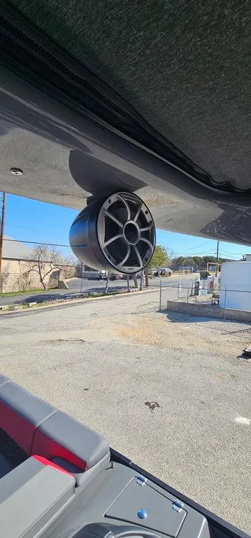 Slide: The Image of 2023 Berkshire 25RFX STS 3.0 boat speaker system, outdoor setting. - 20