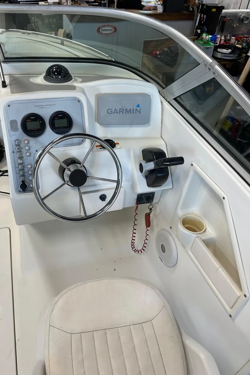 Slide: The Image of 2006 Hydra-Sports Lightning 202 DC boat dashboard with Garmin navigation system. - 11