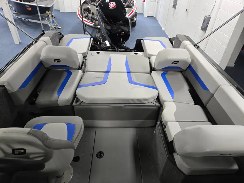 Slide: The Image of 2025 Princecraft Sport 188 boat interior with gray and blue seating arrangement. - 10