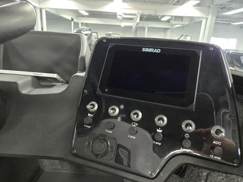 Slide: The Image of Control panel of a 2025 Princecraft Sport 188 boat with Simrad display. - 17
