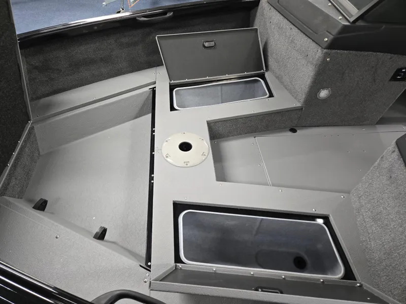 Slide: The Image of 2025 Princecraft Sport 188 boat interior with storage compartments and sleek design. - 6