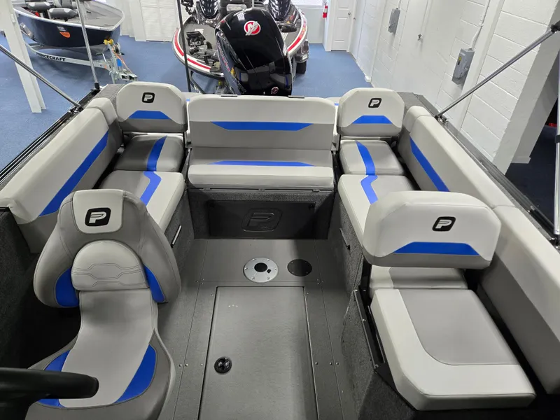 Slide: The Image of 2025 Princecraft Sport 188 boat interior with gray and blue seating arrangement. - 9