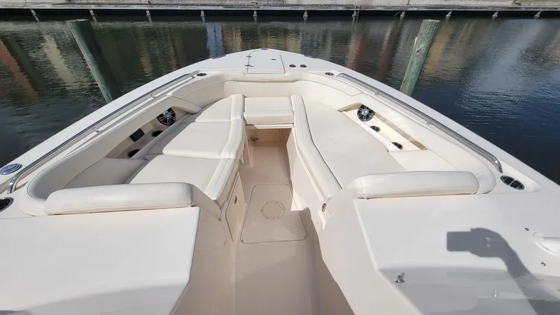 Slide: The Image of 2021 Grady-White Freedom 335 boat interior with spacious seating and elegant design. - 25