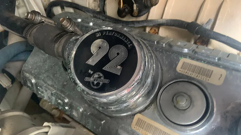 Slide: The Image of Engine detail of a 1994 Sea Ray 500 Sundancer boat. - 13