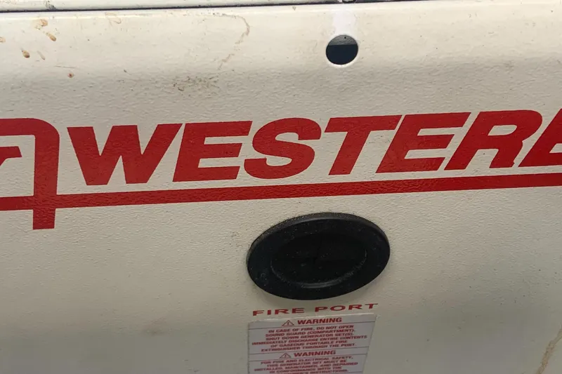 Slide: The Image of Close-up of Westerbeke generator on 1994 Sea Ray 500 Sundancer boat. - 21