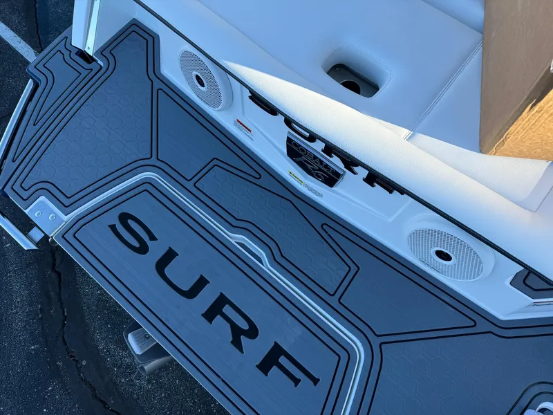 Slide: The Image of 2025 Cobalt R6 Surf boat deck with speakers and "SURF" branding. - 18