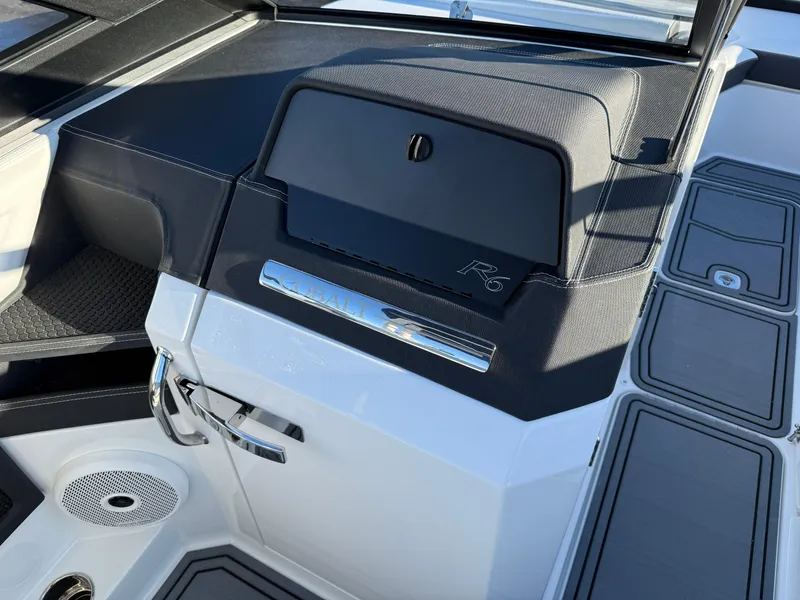 Slide: The Image of 2025 Cobalt R6 Surf boat interior with sleek dashboard and modern design elements. - 28