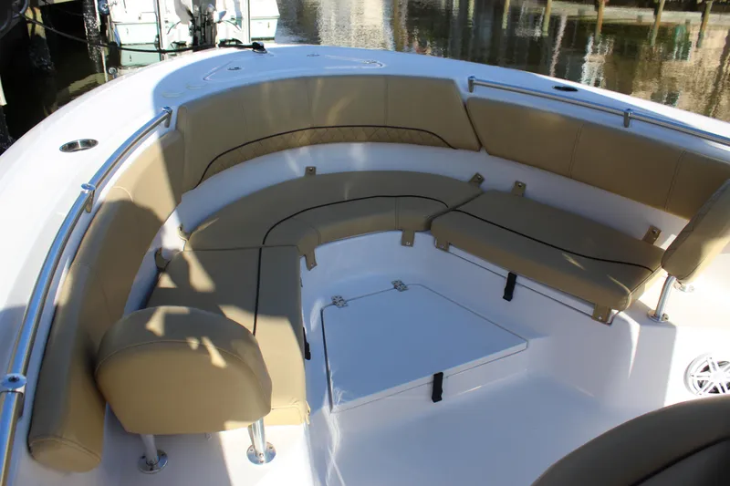Slide: The Image of 2023 Sportsman Heritage 231 Center Console boat with spacious seating area. - 19