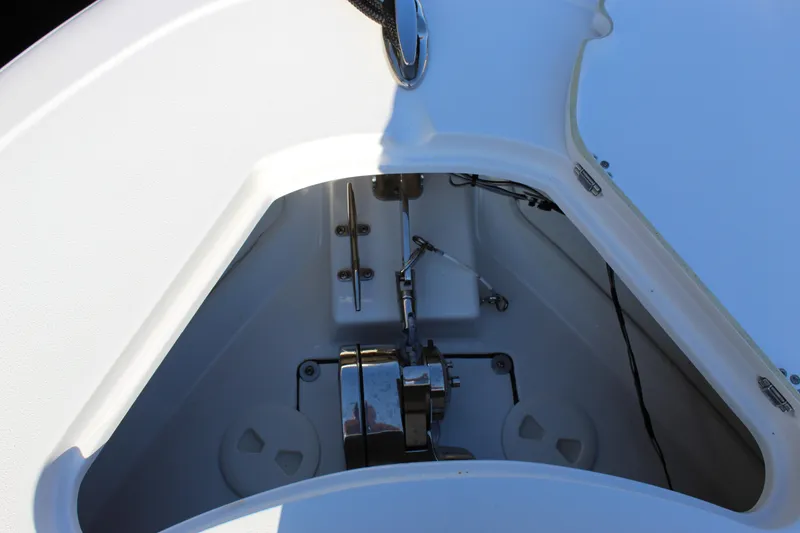 Slide: The Image of 2023 Sportsman Heritage 231 Center Console anchor compartment detail. - 23