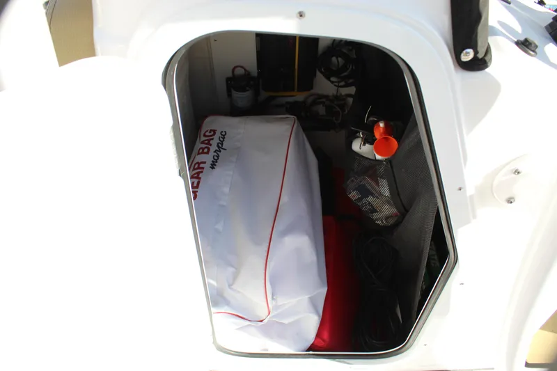 Slide: The Image of Storage compartment of 2023 Sportsman Heritage 231 Center Console boat. - 49