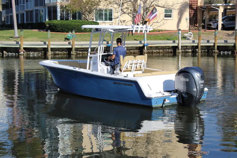 Slide: The Image of 2023 Sportsman Heritage 231 Center Console boat on calm water. - 5