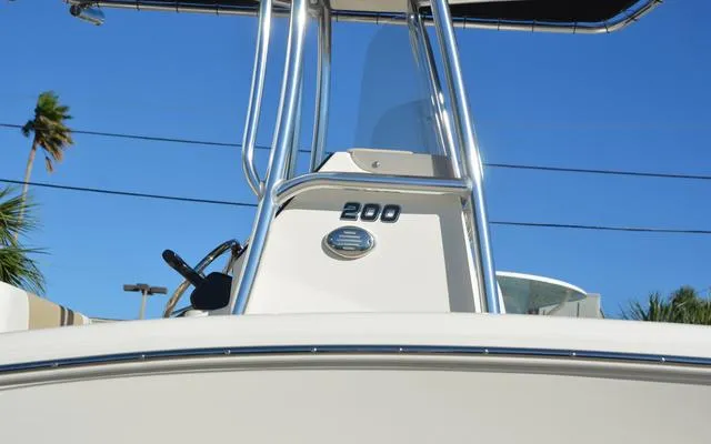Slide: The Image of 2025 Bulls Bay 200 CC boat console with clear blue sky background. - 13