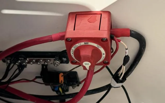Slide: The Image of Battery switch and wiring in a 2025 Bulls Bay 200 CC boat. - 16