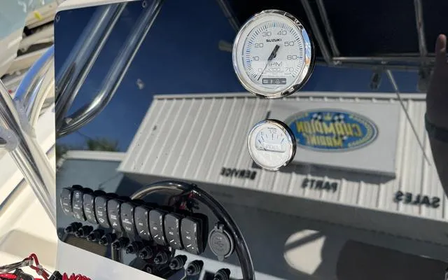 Slide: The Image of Dashboard of 2025 Bulls Bay 200 CC boat with gauges and switches. - 23