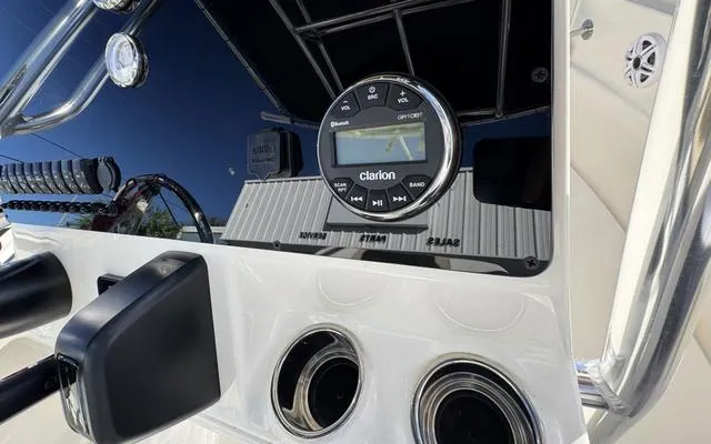 Slide: The Image of 2025 Bulls Bay 200 CC boat dashboard with Clarion audio system and controls. - 25
